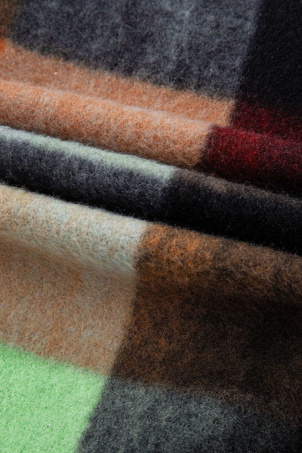 Veste longue orange à carreaux et poche à rabat